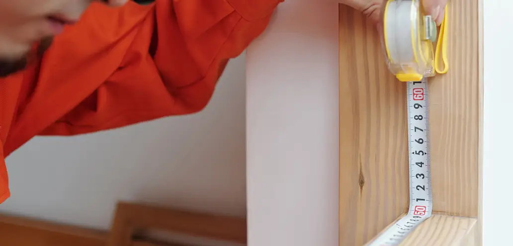 Designer taking measurements